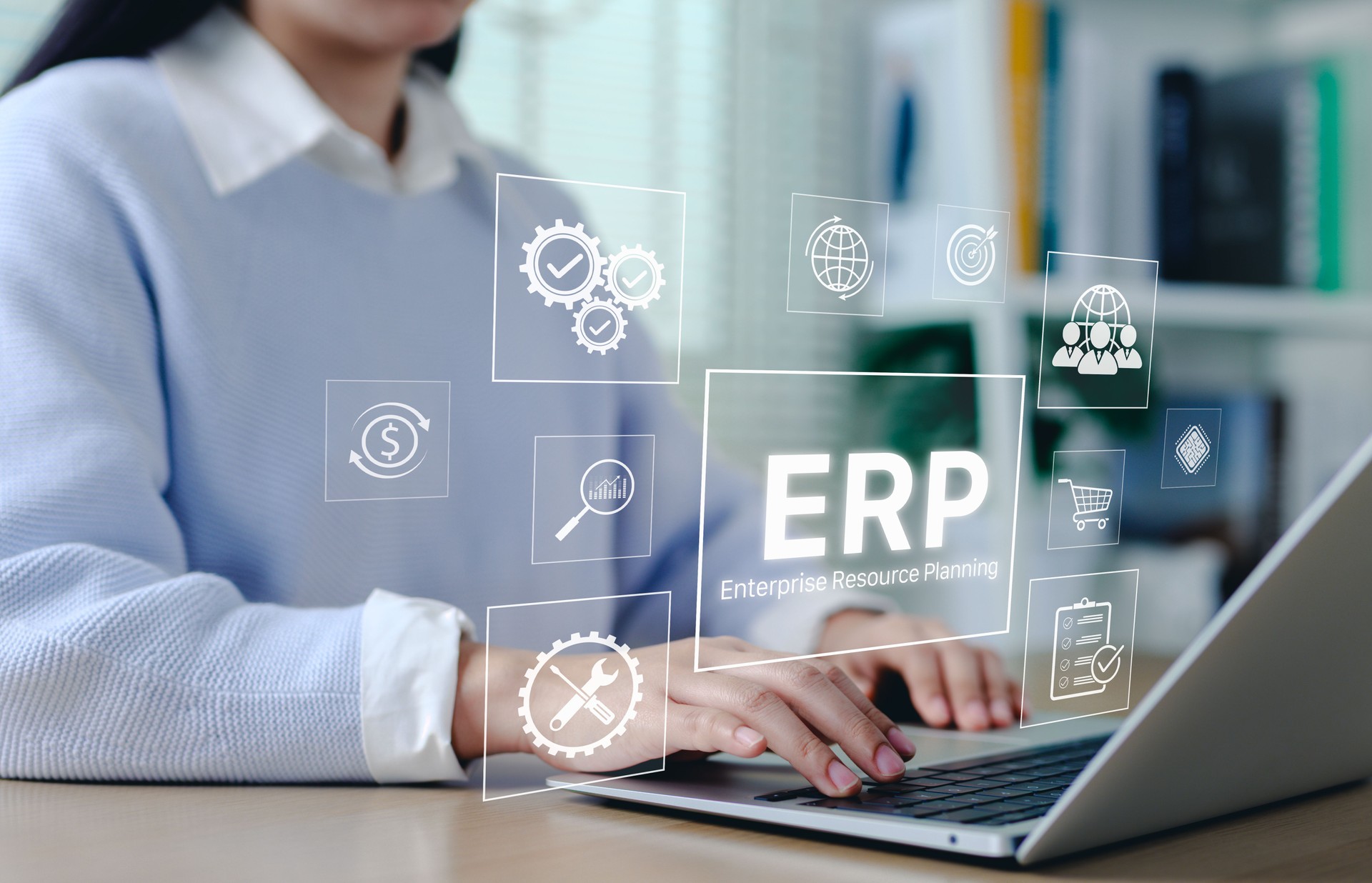 ERP Enterprise Resource Planning system concept. Businesswoman using laptop with interface ERP icons, business automation, data integration, workflow management, and software systems for corporate.