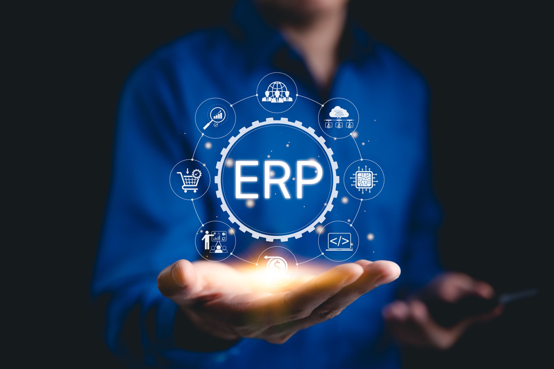 ERP - Enterprise Resource Planning Concept. Business professional presenting ERP system icons representing enterprise resource planning, data integration, and automation tools. ERP system software,